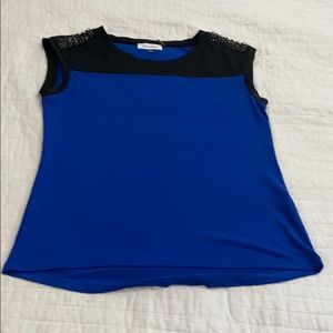 Blue and black sleeveless top with rhinestones